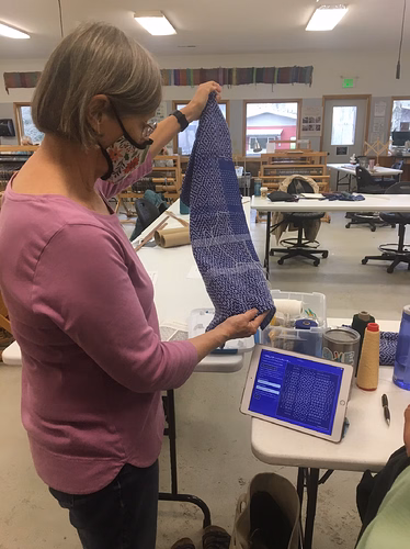 weaving and looking at pattern preview on ipad